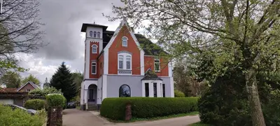 Ein Garten an der Unterkunft Villa Kunterbunt, Gemütlichkeit am Waldesrand