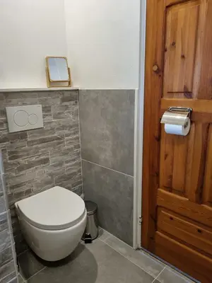Ein Badezimmer in der Unterkunft Ferienhaus Norderpiep 54