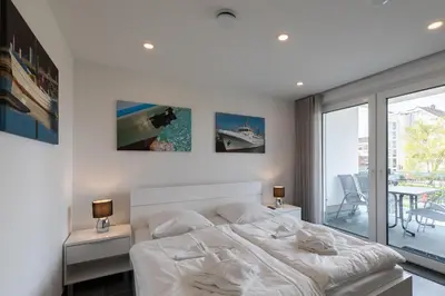 Ein Bett oder Betten in einem Zimmer der Unterkunft Wohnung 2 Strandbrise