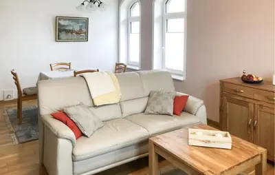 Ein Sitzbereich in der Unterkunft Cozy Apartment In Wurster Nordseeküste