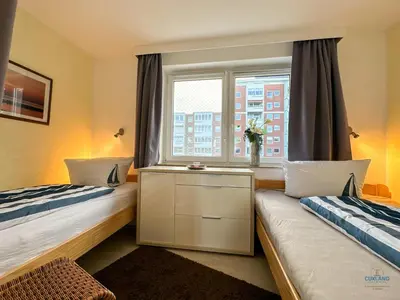 Ein Bett oder Betten in einem Zimmer der Unterkunft Residenz Thalassa Döse Wohnung 1