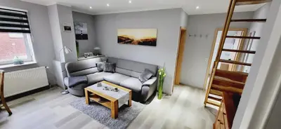 Ein Sitzbereich in der Unterkunft Haus Küstenheide