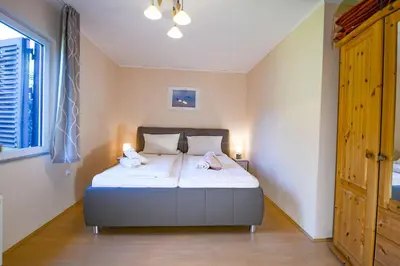 Ein Bett oder Betten in einem Zimmer der Unterkunft Zum Surgrund ZS08
