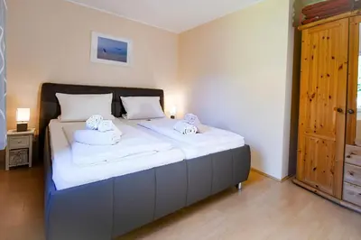 Ein Bett oder Betten in einem Zimmer der Unterkunft Zum Surgrund ZS08