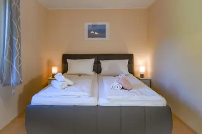 Ein Bett oder Betten in einem Zimmer der Unterkunft Zum Surgrund ZS08