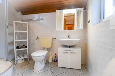 Ein Badezimmer in der Unterkunft Zum Surgrund ZS08