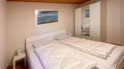 Ein Bett oder Betten in einem Zimmer der Unterkunft Ferienwohnung am Sonnenstrahl