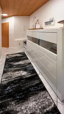 Ein Bett oder Betten in einem Zimmer der Unterkunft Ferienwohnung am Sonnenstrahl