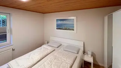 Ein Bett oder Betten in einem Zimmer der Unterkunft Ferienwohnung am Sonnenstrahl