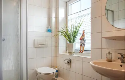Ein Badezimmer in der Unterkunft Gorgeous Apartment In Otterndorf