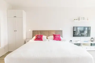 Ein Bett oder Betten in einem Zimmer der Unterkunft 
