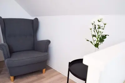Ein Sitzbereich in der Unterkunft Wattwürmchen