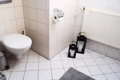 Ein Badezimmer in der Unterkunft Wattwürmchen