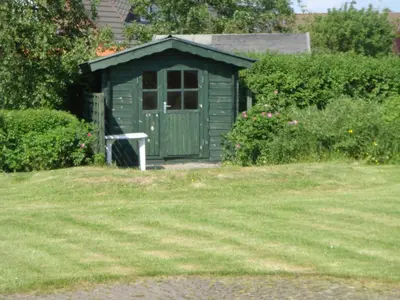 Ein Garten an der Unterkunft Haus Tötel DHH 3