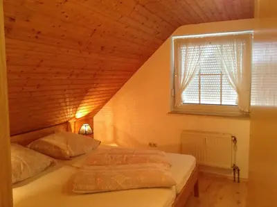 Ein Bett oder Betten in einem Zimmer der Unterkunft Haus Tötel DHH 3