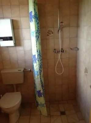 Ein Badezimmer in der Unterkunft Haus Tötel DHH 4