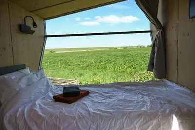 Ein Bett oder Betten in einem Zimmer der Unterkunft Sleep Space 4 - Green Tiny Spot Cuxhaven Altenbruch