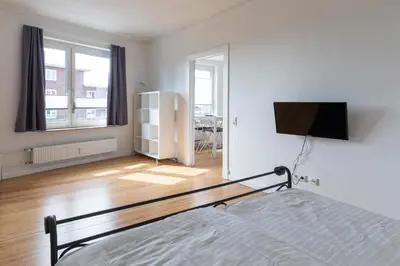 Ein Bett oder Betten in einem Zimmer der Unterkunft Wohnung Deichbude