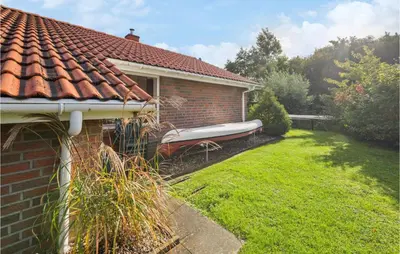 Ein Garten an der Unterkunft Cozy Home In Otterndorf With Sauna