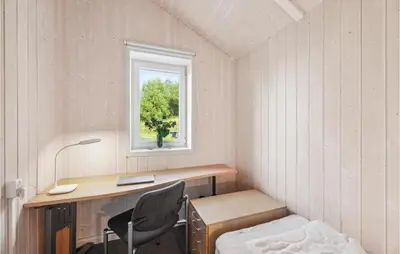 Ein Bett oder Betten in einem Zimmer der Unterkunft Cozy Home In Otterndorf With Sauna