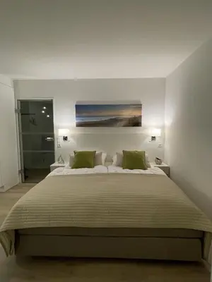 Ein Bett oder Betten in einem Zimmer der Unterkunft Lord Nelson 414