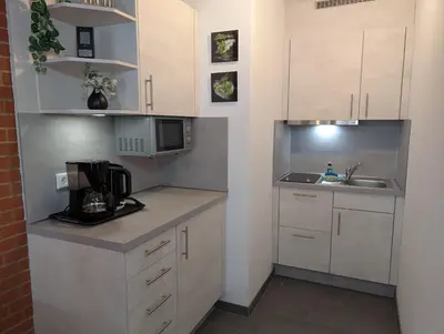 Küche/Küchenzeile in der Unterkunft Terrassenhaus, FeWo 19