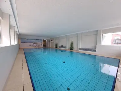 Der Swimmingpool an oder in der Nähe von Terrassenhaus, FeWo 95