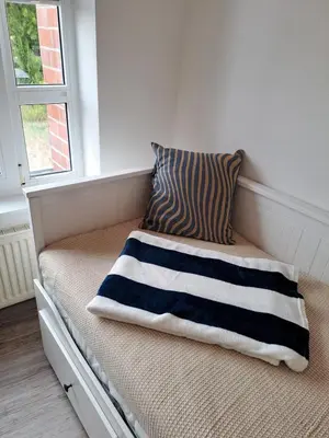 Ein Bett oder Betten in einem Zimmer der Unterkunft de Bark