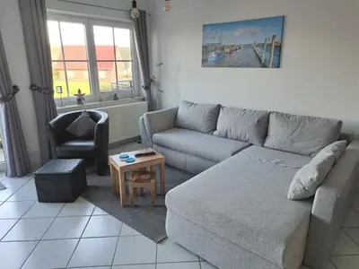 Ein Sitzbereich in der Unterkunft Haus Sonnenstrahl 11