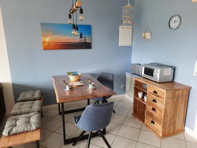 Ein Sitzbereich in der Unterkunft Haus Sonnenstrahl 11