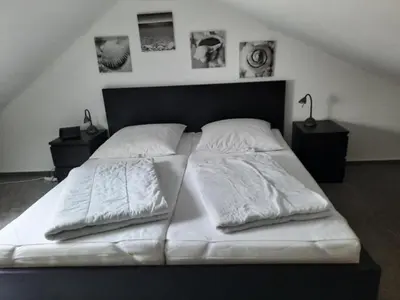 Ein Bett oder Betten in einem Zimmer der Unterkunft Haus Sonnenstrahl 11