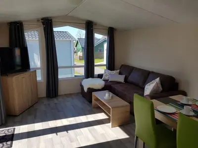 Ein Sitzbereich in der Unterkunft Mobilheim Seeschwalbe am Kransburger See 542