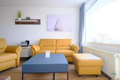 Ein Sitzbereich in der Unterkunft Haus Lord Nelson Döse Wohnung 406