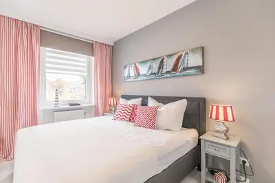 Ein Bett oder Betten in einem Zimmer der Unterkunft 