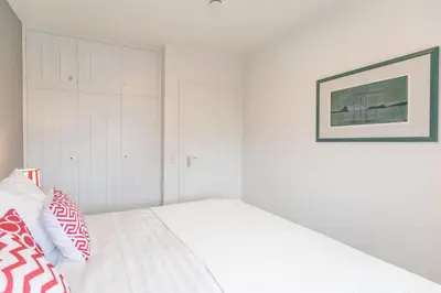 Ein Bett oder Betten in einem Zimmer der Unterkunft 