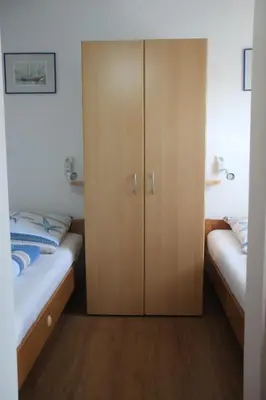 Ein Bett oder Betten in einem Zimmer der Unterkunft Ferienhaus Besken