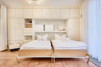 Ein Bett oder Betten in einem Zimmer der Unterkunft Am Ringwall 84A