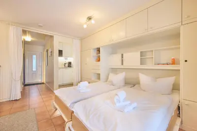 Ein Bett oder Betten in einem Zimmer der Unterkunft Am Ringwall 84A