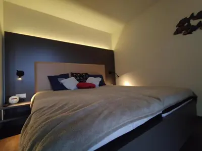 Ein Bett oder Betten in einem Zimmer der Unterkunft Moin im Deichgraf