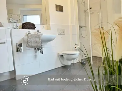 Ein Badezimmer in der Unterkunft Ferienwohnung de Kattuul direkt am Nordseedeich
