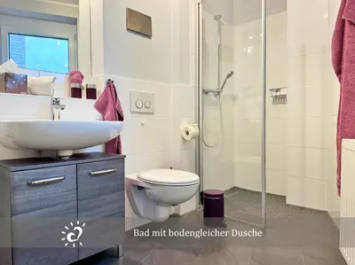 Ein Badezimmer in der Unterkunft De Reetpieper