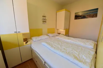 Ein Bett oder Betten in einem Zimmer der Unterkunft Haus Elisabeth Appartement ELI12