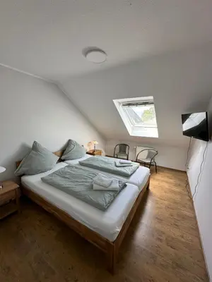 Ein Bett oder Betten in einem Zimmer der Unterkunft Ferienwohnung Molly