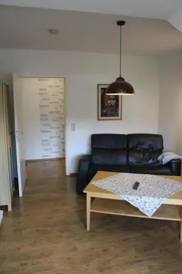 Ein Sitzbereich in der Unterkunft Ferienwohnung Molly