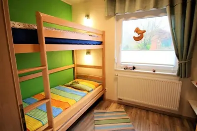 Ein Bett oder Betten in einem Zimmer der Unterkunft Haus am Wasser - a90627