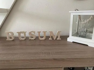 Ein Zertifikat, Auszeichnung, Logo oder anderes Dokument, das in der Unterkunft Blinkfuer 10 ausgestellt ist