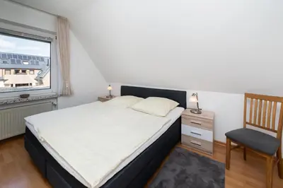 Ein Bett oder Betten in einem Zimmer der Unterkunft Antje