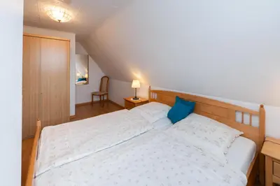 Ein Bett oder Betten in einem Zimmer der Unterkunft Antje