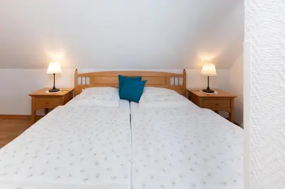 Ein Bett oder Betten in einem Zimmer der Unterkunft Antje