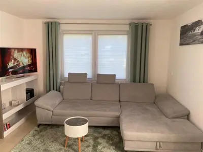 Ein Sitzbereich in der Unterkunft Ferienhaus Damian